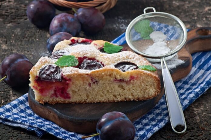 delicious-homemade-cake-with-plums-wooden_2829-11114