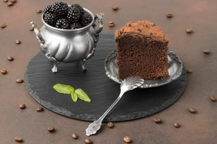 high-angle-chocolate-cake-slice-with-blackberries-scaled
