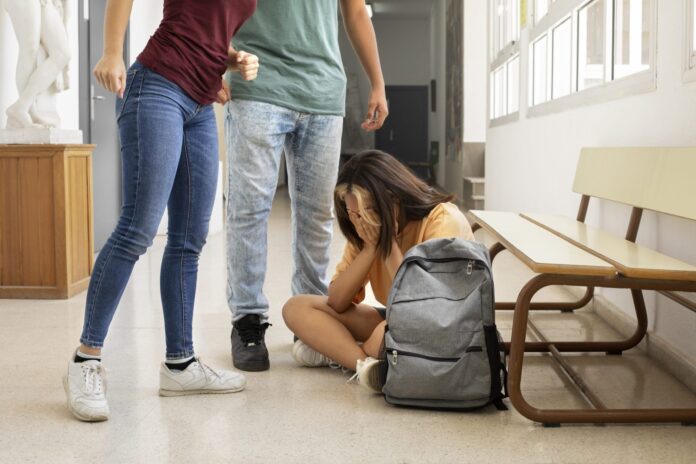 side-view-girl-getting-bullied-school-scaled-1
